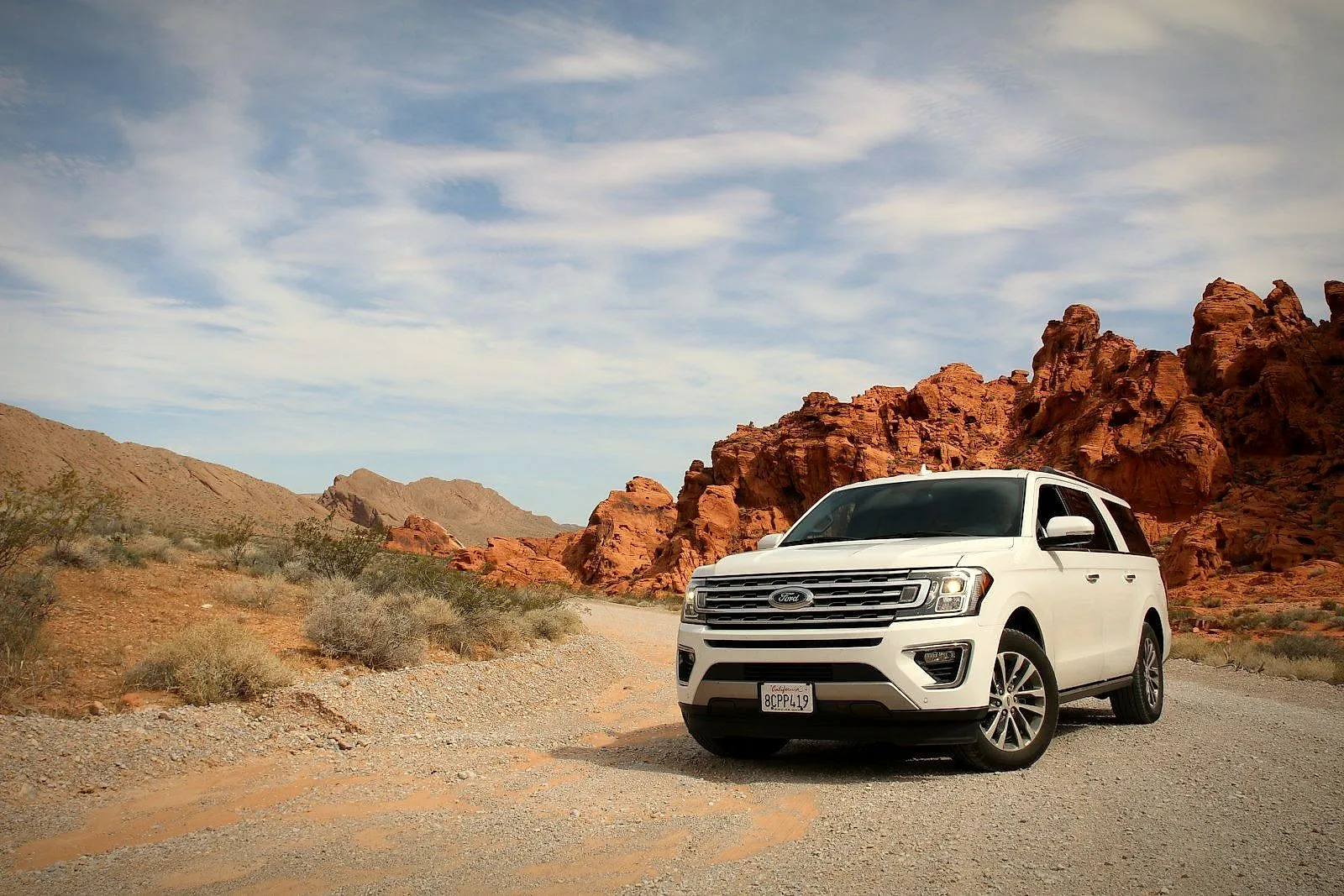 Family SUV on a desert road
