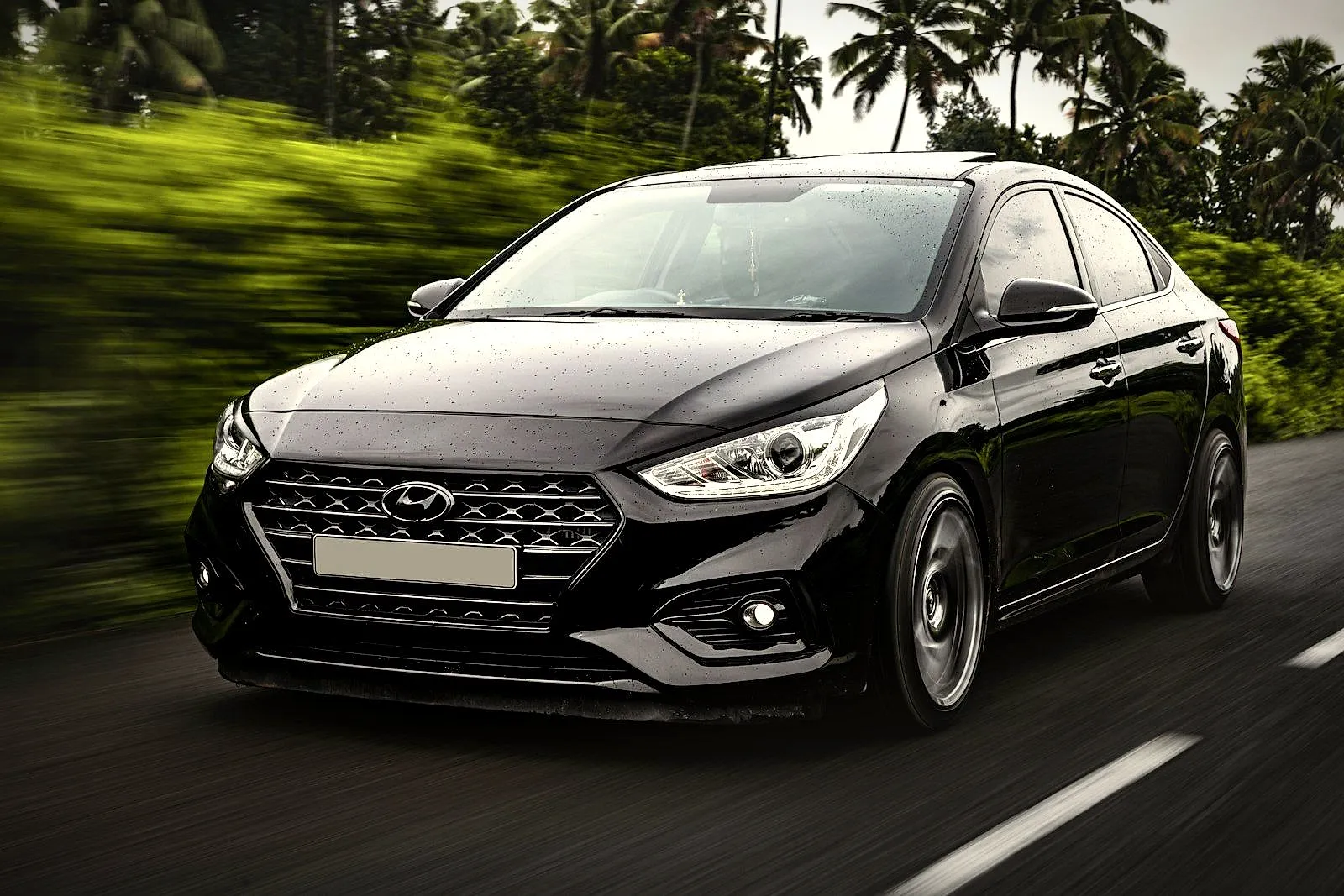 Black sedan in motion
